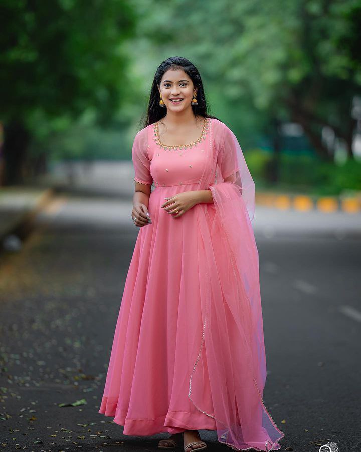 Elegant Pink Anarkali Gown with Sheer Dupatta and Embellished Neckline