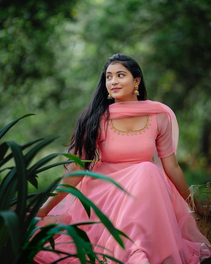 Elegant Pink Anarkali Gown with Sheer Dupatta and Embellished Neckline